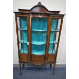 AN EDWARDIAN MAHOGANY AND MARQUETRY INLAID DISPLAY CABINET, raised back with ribbon surmount, double