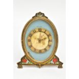 A DOXA FRAMED CLOCK, a round painted portait dial of two women in a garden (worn) Arabic