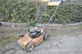 A VINTAGE QUALCAST PETROL LAWN MOWER with a Briggs and Stratton 3.5Hp engine (engine pulls freely