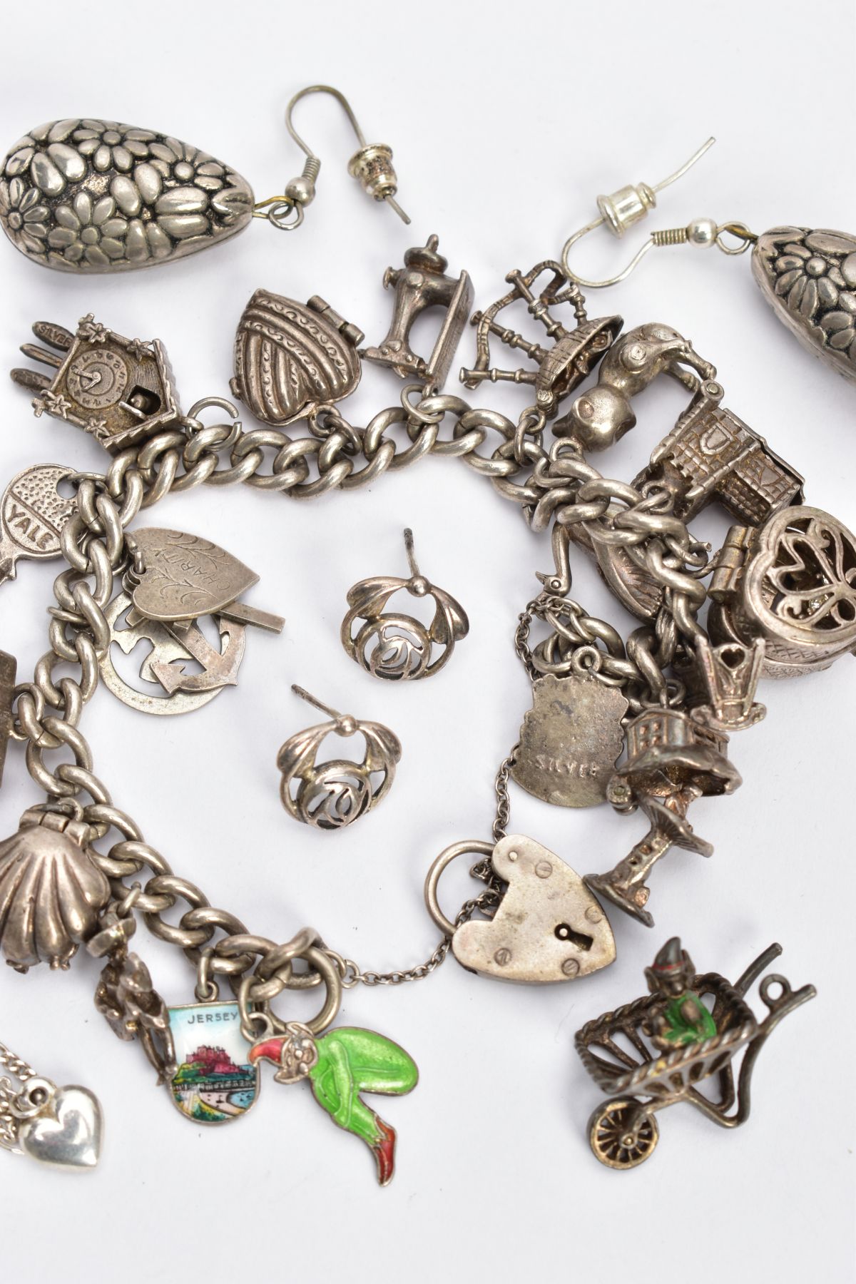 A BAG OF ASSORTED SILVER AND WHITE METAL JEWELLERY, to include a charm bracelet fitted with - Image 3 of 3