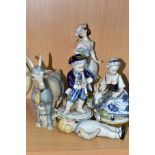 THREE CONTINENTAL CERAMIC FIGURINES, A GOAT FIGURE AND A BISQUE DOLL, comprising two Unter Weiss