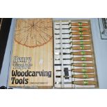 A BOXED HENRY TAYLOR WOODCARVING TOOLS 12 PIECE CRAFTSMANS SET, wooden handles each bearing