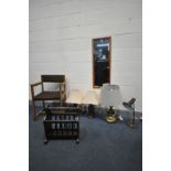 A MID CENTURY OAK CHAIR, with open armrests, pair of table lamps, brass table lamp, all with shades,