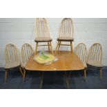 AN ERCOL WINDSOR BLONDE ELM DROP LEAF DINING TABLE, model 492, open length 125cm x closed length