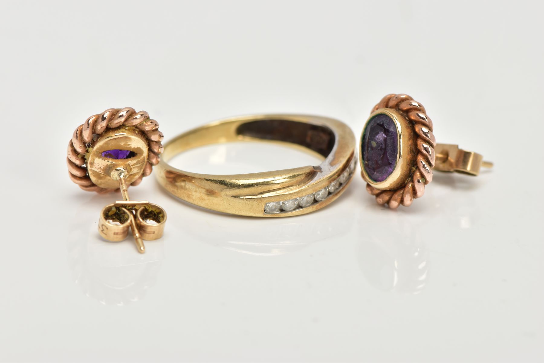 A 9CT GOLD DIAMOND HALF ETERNITY RING AND A PAIR OF 9CT GOLD AMETHYST EARRINGS, the ring of a - Image 2 of 3