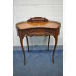 A REPRODUCTION FRENCH STYLE MAHOGANY KIDNEY SHAPED LADIES DESK, with a pierced brass gallery