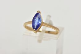 A 9CT GOLD TANZANITE RING, designed with a marquise cut tanzanite, approximate dimensions length