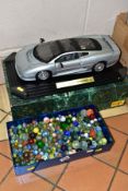 A MAISTO 1/12 SCALE DIECAST MODEL OF A JAGUAR XJ220, approximate length of car 40cm, with box and