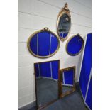 A PAIR OF FRENCH GILT FRAMED OVAL WALL MIRROR with a ribbon surmount (minor losses) along with a