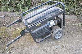 AN UNBRANDED PETROL GENERATOR with a 6.5 Hp engine (engine pulls freely but hasn't started)