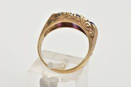 A MODERN 9CT GOLD SEVEN STONE DRESS RING, designed with three oval cut amethyst's, interspaced