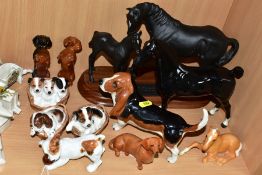 A COLLECTION OF ROYAL DOULTON AND BESWICK DOG AND HORSE FIGURES, comprising four Royal Doulton