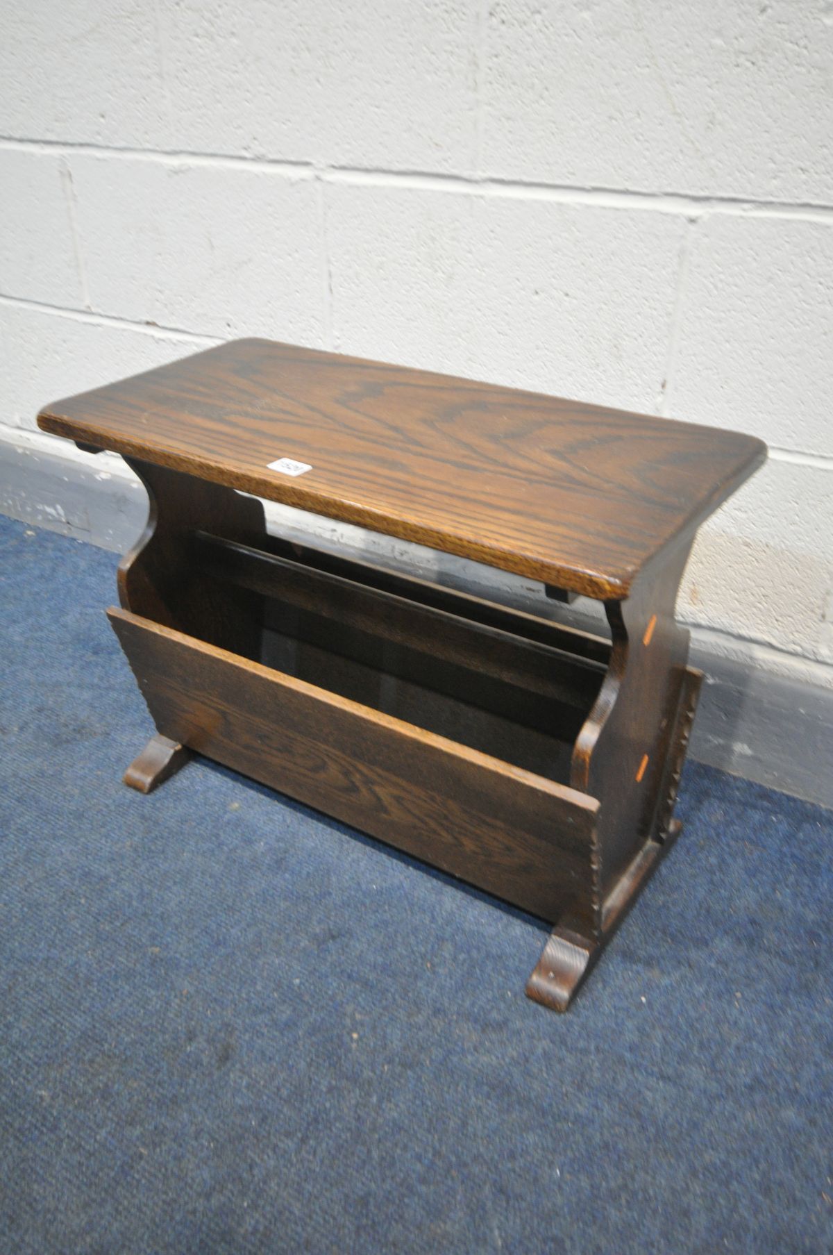 A REPRODUCTION OAK MAGAZINE RACK