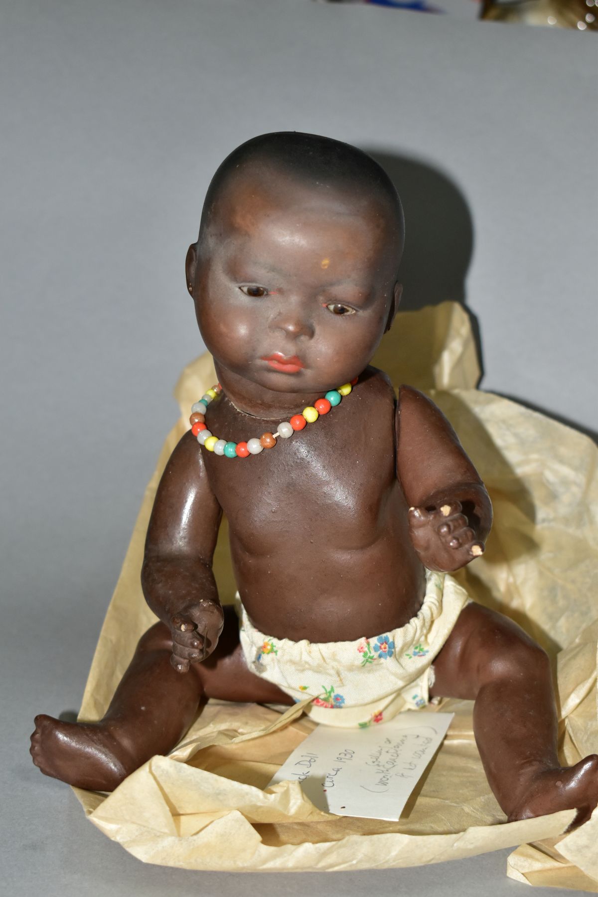 A GERMAN KB-M 1 BLACK BISQUE HEAD DOLL, composite body and bent limbs, sleeping eyes, pierced - Image 2 of 7