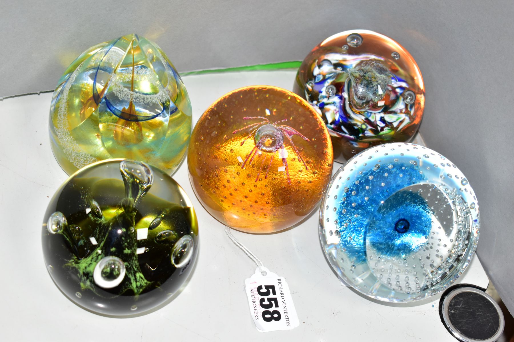 FIVE CAITHNESS GLASS PAPERWEIGHTS, three being limited editions, comprising 'Moonflower', 'Mists