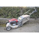 A LAWNFLITEPRO 553HRS SELF PROPELLED PETROL LAWN MOWER with a Honda 5.5 OHV engine and grass box (