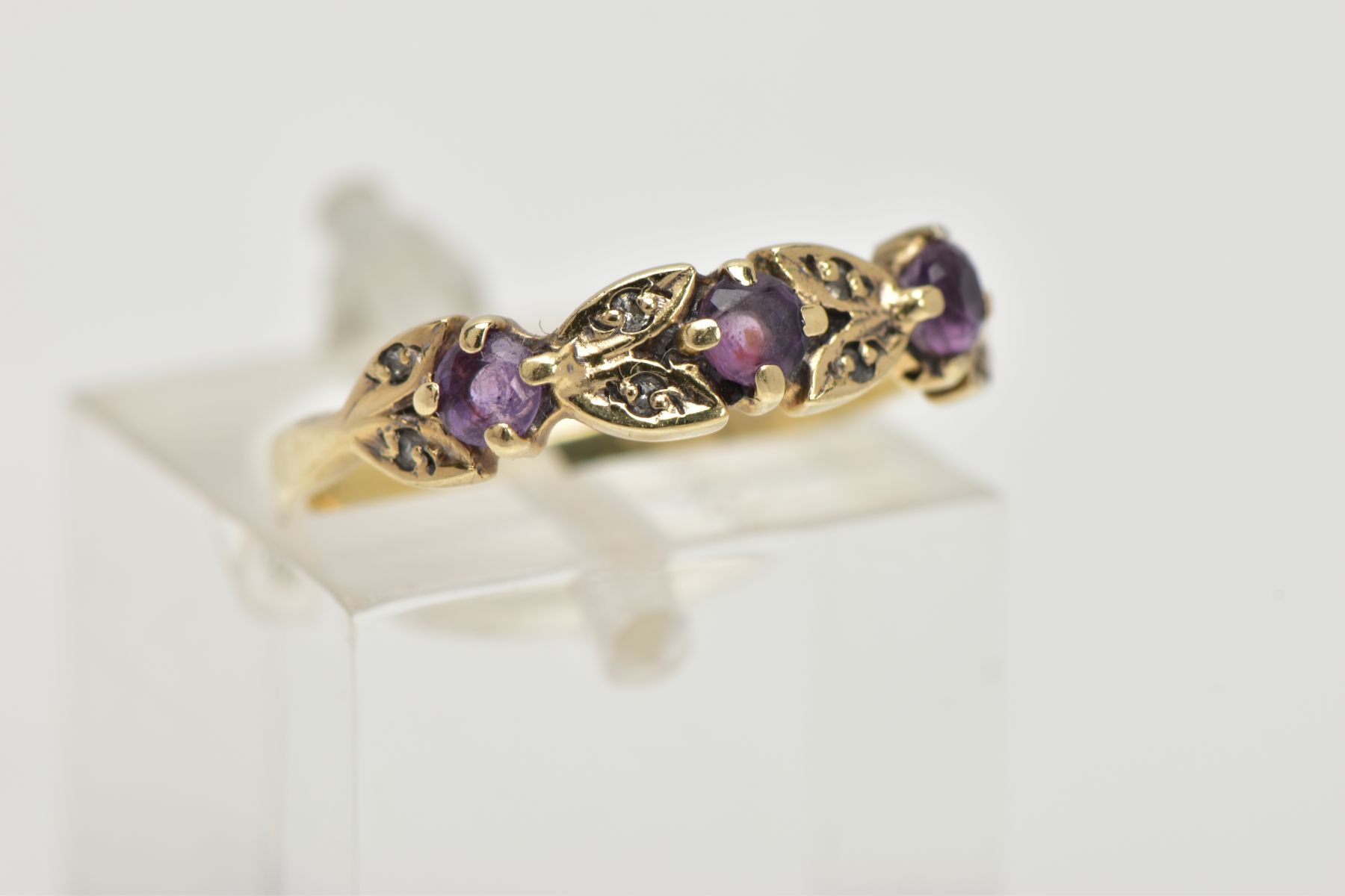 A 9CT GOLD AMETHYST AND DIAMOND RING, half eternity style ring, set with three circular cut - Image 4 of 4