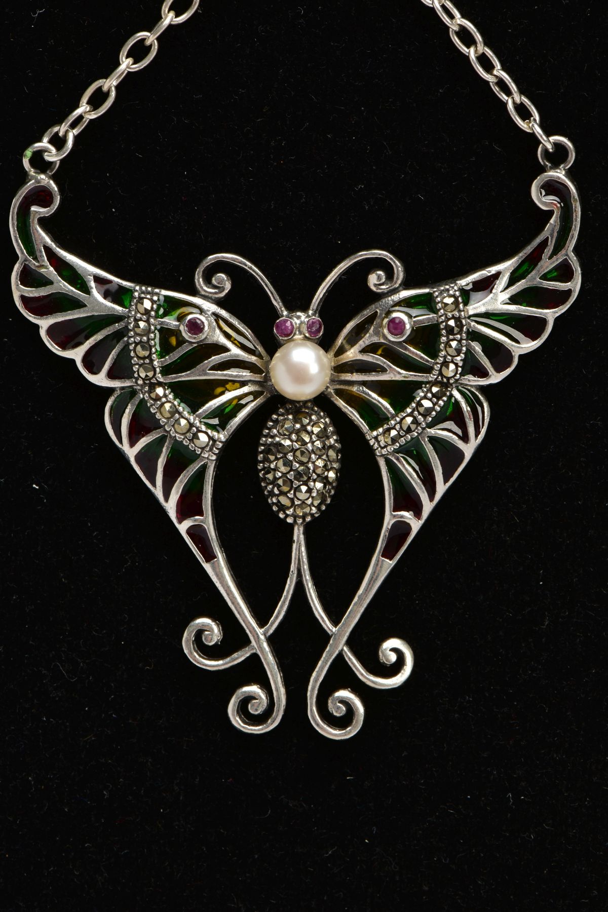 A PLIQUE A' JOUR BUTTERFLY NECKLACE, a white metal butterfly set with four circular cut rubies, a - Image 2 of 5