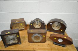 SIX VARIOUS ART DECO MANTEL CLOCKS, of various shapes and materials, four with pendulums and three