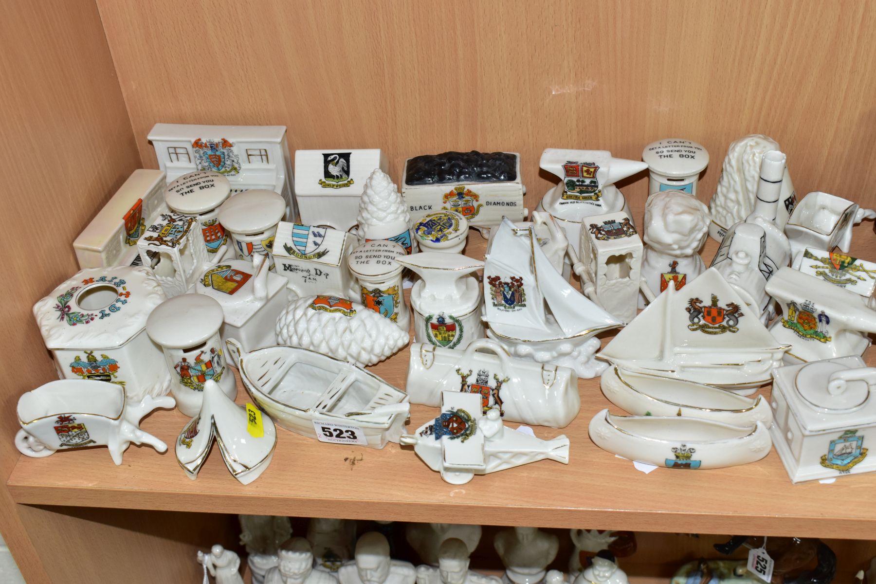 A COLLECTION OF APPROXIMATELY THIRTY FIVE PIECES OF CRESTED CHINA, including a Continental aeroplane