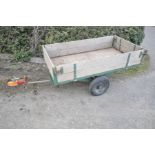 A BUCKINGHAM BAWDEN METAL FRAMED TRAILER with hardwood bed and sides, box width 87cm, bed length