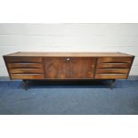 IN THE MANNER OF ARNE VODDER, A MID-CENTURY SOLID TEAK SIDEBOARD, with three drawers to each end