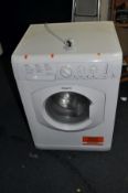 A HOTPOINT HV7L1451 WASHING MACHINE width 60cm x depth 55cm x height 85cm (PAT pass and powers up)