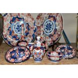 A GROUP OF JAPANESE IMARI PATTERN CERAMICS, comprising of a pair of 46cm chargers, decorated with