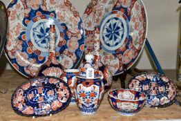 A GROUP OF JAPANESE IMARI PATTERN CERAMICS, comprising of a pair of 46cm chargers, decorated with