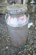 A VINTAGE PAINTED STEEL MILK CHURN with two handles and lid, height 72cm