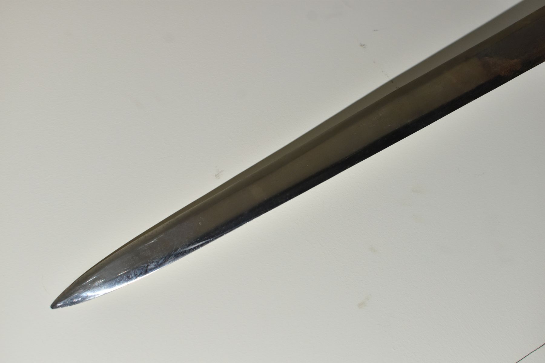 A LARGE REPRODUCTION SWORD, with leather grip, pierced cross guard, sharpened blade, length 142cm ( - Image 6 of 6