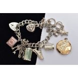 A SILVER CHARM BRACELET AND A LOCKET, the double curb link bracelet, some links stamped with a