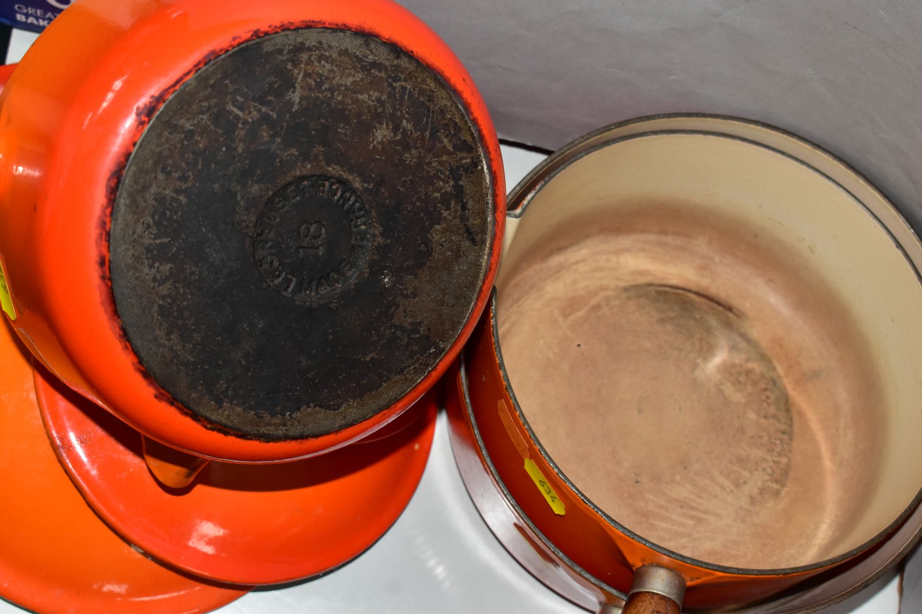 A GRADUATED SET OF FOUR LE CREUSET ORANGE ENAMEL SAUCEPANS AND LIDS, wooden handles, pouring lips, - Image 4 of 6