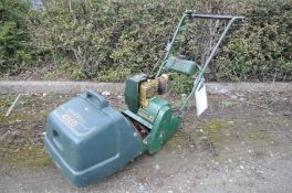 AN ATCO COMMODORE B12 PETROL CYLINDER MOWER with grass box (engine pulls freely and starts)