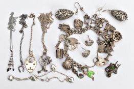 A BAG OF ASSORTED SILVER AND WHITE METAL JEWELLERY, to include a charm bracelet fitted with