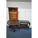 A REPRODUCTION OAK OVAL DROP LEAF TABLE, a mahogany French style cabinet with three drawers and a