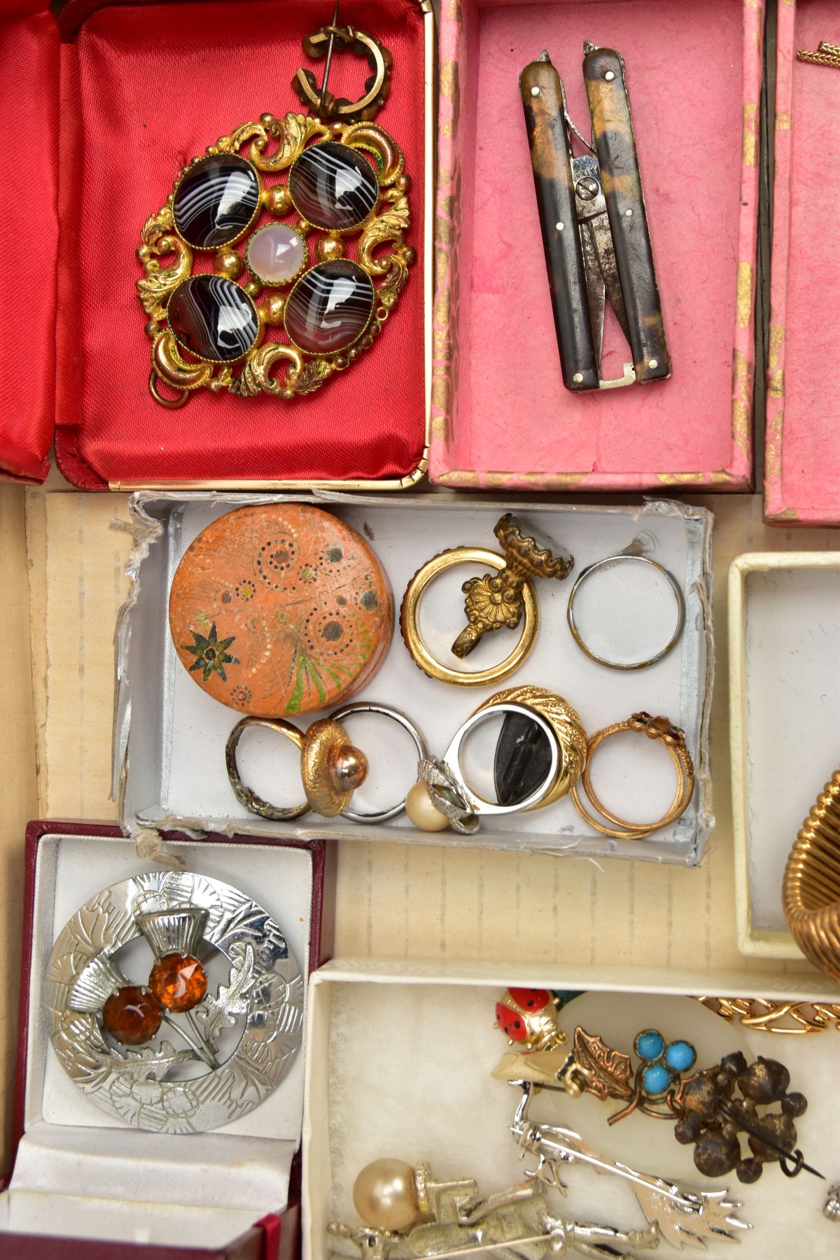 A BOX OF ASSORTED COSTUME JEWELLERY, to include a carnelian pin, a mother of pearl early 20th - Image 3 of 4