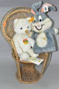 A STEIFF COSY FRIENDS TEDDY BEAR, A BUGS BUNNY GLOVE PUPPET AND A DOLLS WICKER PEACOCK CHAIR, a