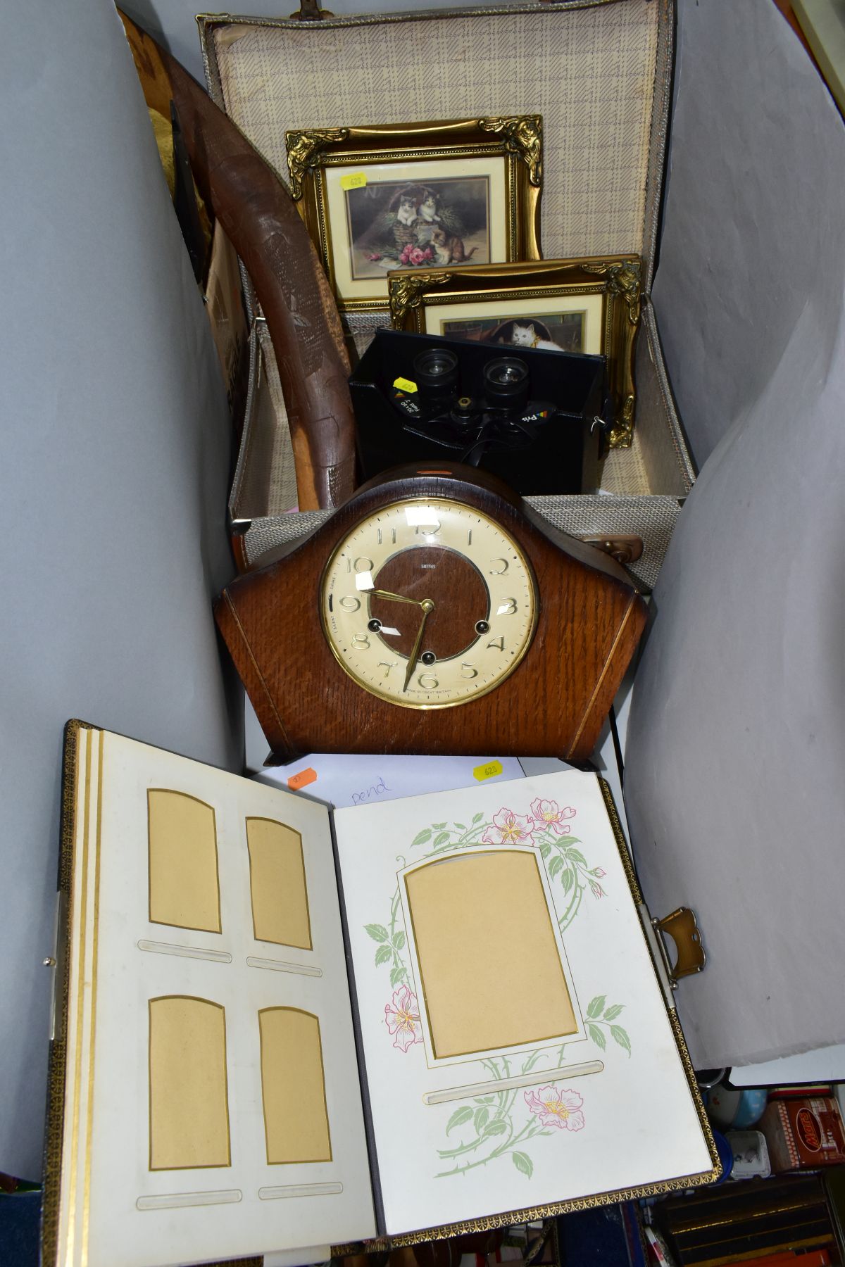 A MANTEL CLOCK, A PHOTOGRAPH ALBUM, A SUITCASE AND SUNDRY ITEMS, comprising a twentieth century