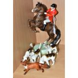 A BESWICK HUNTSMAN ON REARING HORSE, model no 868, style two, brown gloss, impressed marks to