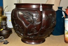 A RELIEF MOULDED BRONZED METAL JARDINIERE, decorated with birds and cherry blossom trees,