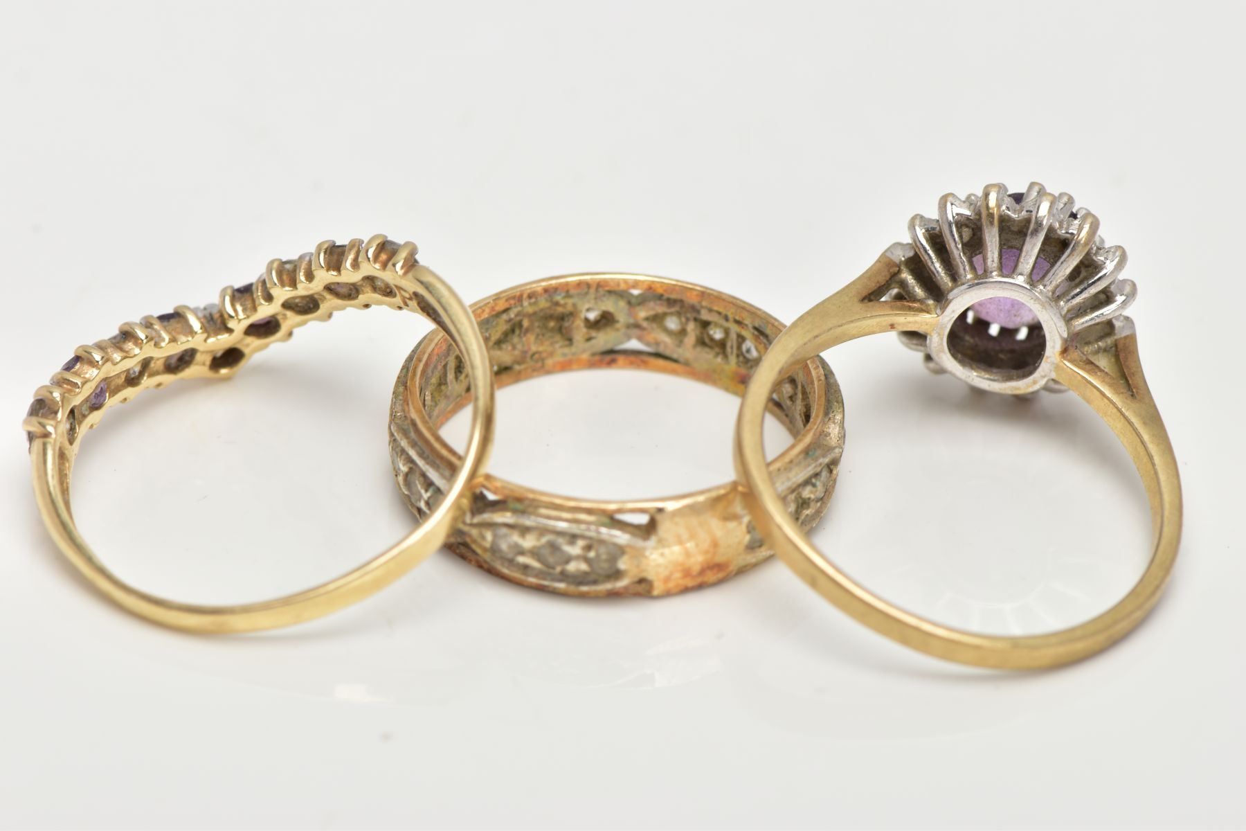 TWO 9CT GOLD GEM SET RINGS AND ONE OTHER, the first a cluster ring centring on an oval cut - Image 3 of 3