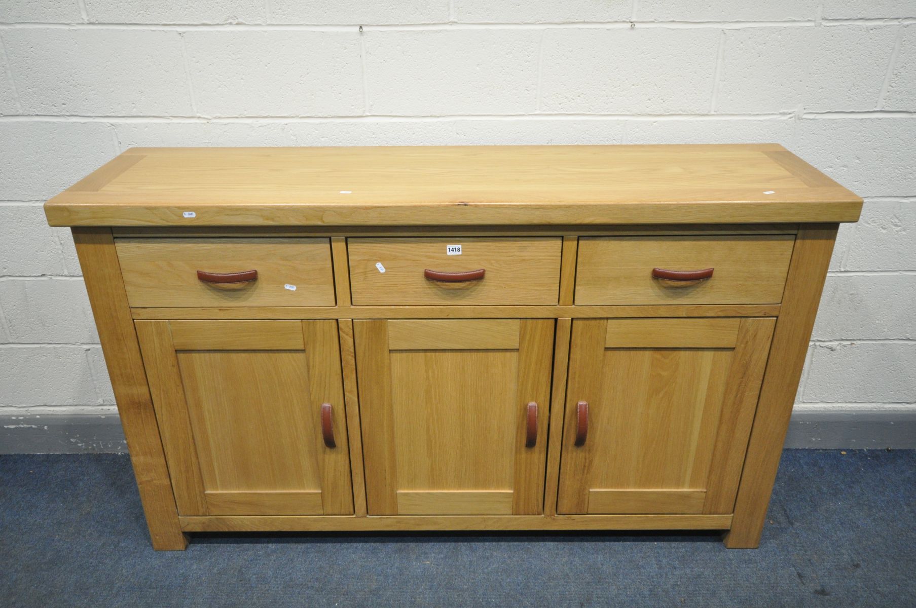 A 'GLOBAL HOME' LIGHT OAK SIDEBOARD, with three drawers, width 170cm x depth 45cm x height 100cm