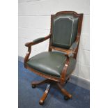 A HARDWOOD AND GREEN LEATHER SWIVEL OFFICE CHAIR, with open armrests (condition:-gilt finish to