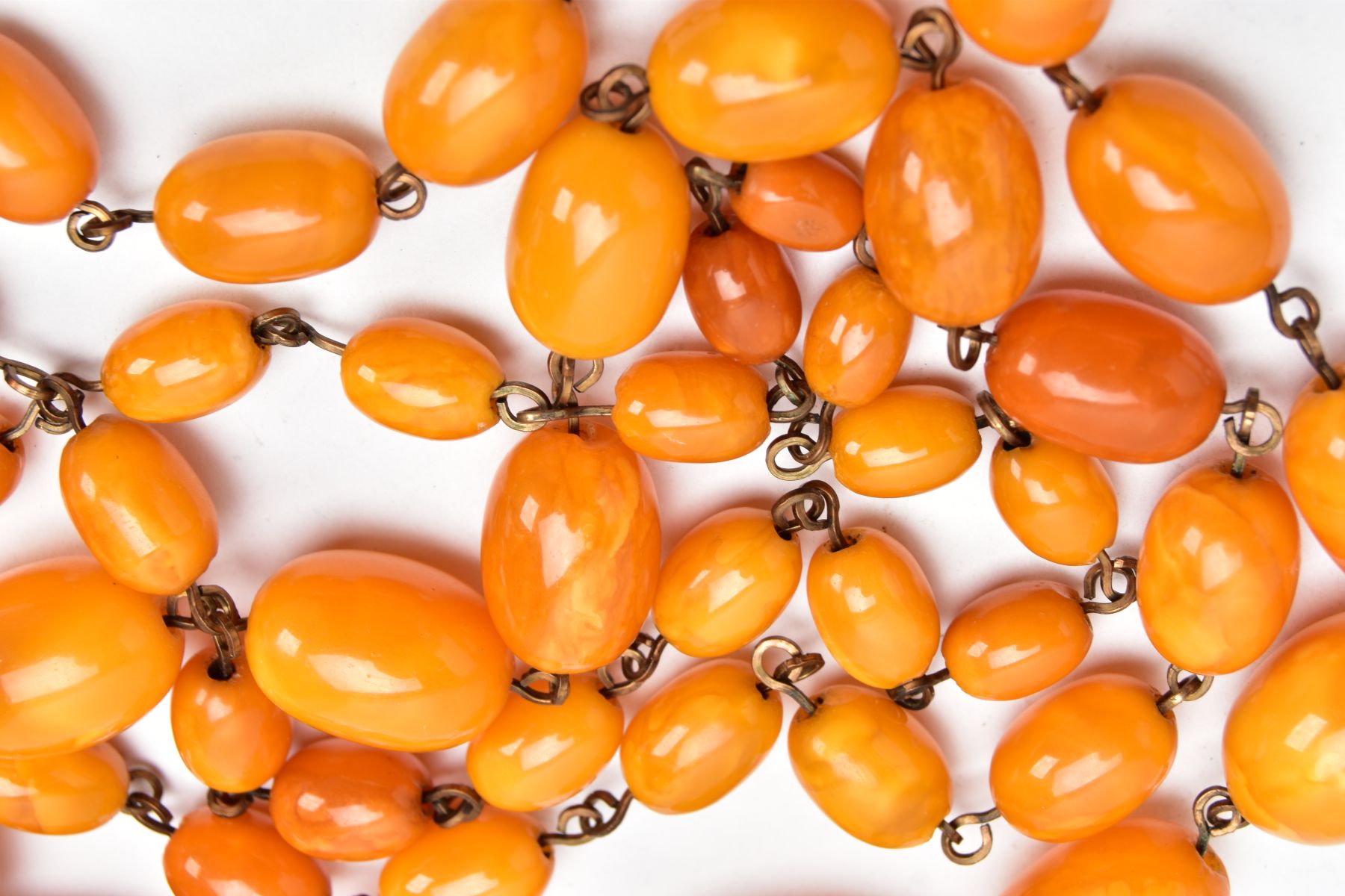 A NATURAL AMBER GRADUATED BEAD NECKLACE, graduated beads, largest measuring approximately 23.0mm x - Image 3 of 3