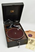 A HMV BLACK CASED PORTABLE GRAMOPHONE MODEL 102, with printed instructions and a Nat King Cole