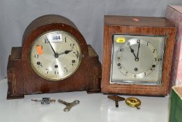 TWO EARLY 20TH CENTURY MANTEL CLOCKS, comprising an oak cased dome top Westminster chime 8 day