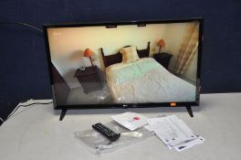A LG 32LJ510B 32in TV with remote (PAT pass and working)