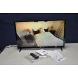 A LG 32LJ510B 32in TV with remote (PAT pass and working)