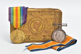 A 1914 PRINCESS MARY TIN, containing a British War & Victory pair of medals, named 3528 Sjt J.S.